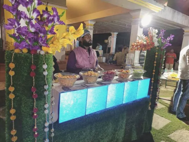 Illuminated live counter at an evening event